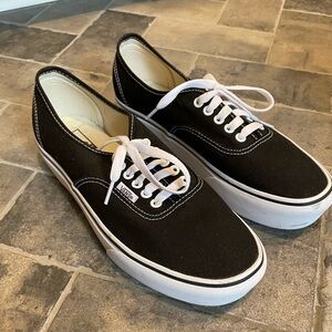 Vans black and white low sneakers. Unisex. Women’s size 11.